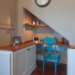 desk area located under stairs