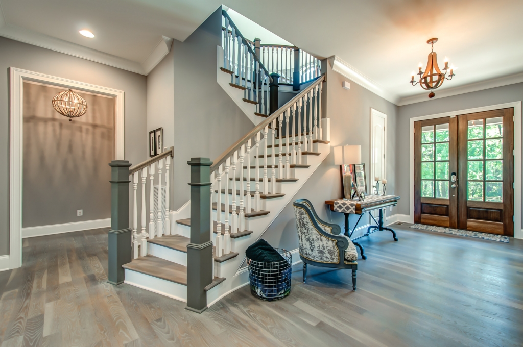 Custom Staircase & foyer of home by Hannah Custom Homes